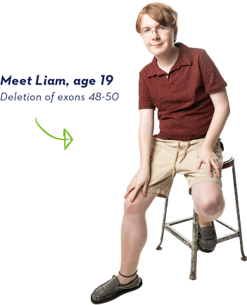 EXONDYS 51 patient Liam EXONDYS 51 patient Liam, age 19, sitting on a stool looking at the camera with a white background